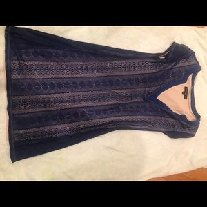 Indigo overlay on nude lining dress